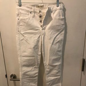 White button-fly madewell skinny jeans. Raw bottom